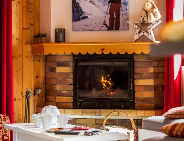 Fire place in chalet Snow Paradise