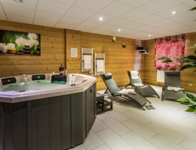 wellness area with hot tub and sauna