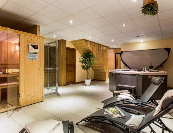 wellness area with hot tub and sauna