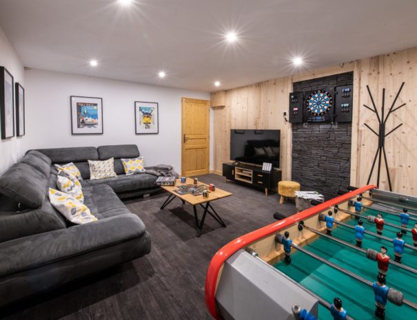 Game room with table soccer in chalet Snow Valley