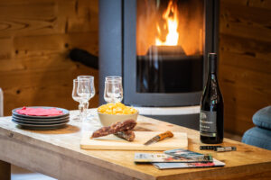 Fire place in chalet Snow Mountain located in le Bettaix - Chalets Lacuzon