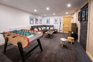 Game room will foosball in chalet Snow Valley located in le Bettaix - Chalets Lacuzon